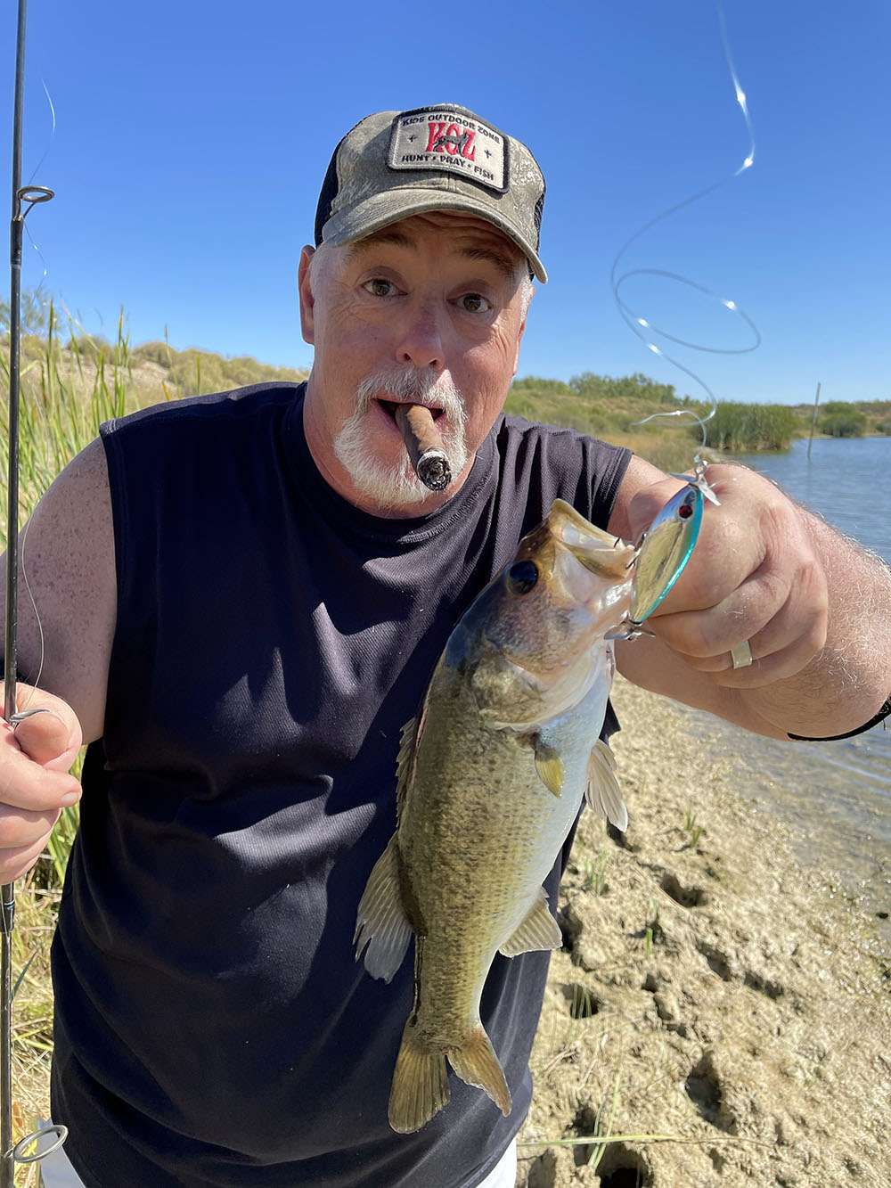 Don holding a fish